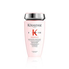 KÉRASTASE Genesis Strengthening Shampoo packaging signals premium care for weakened hair.