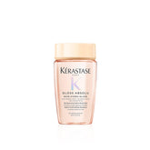 Kerastase Gloss Absolu shampoo bottle shows ultra-smooth glossy finish for bouncy hair