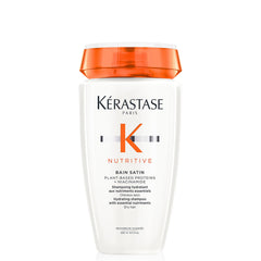KÉRASTASE Nutritive bottle closeup highlighting hydrating formula for dry hair.