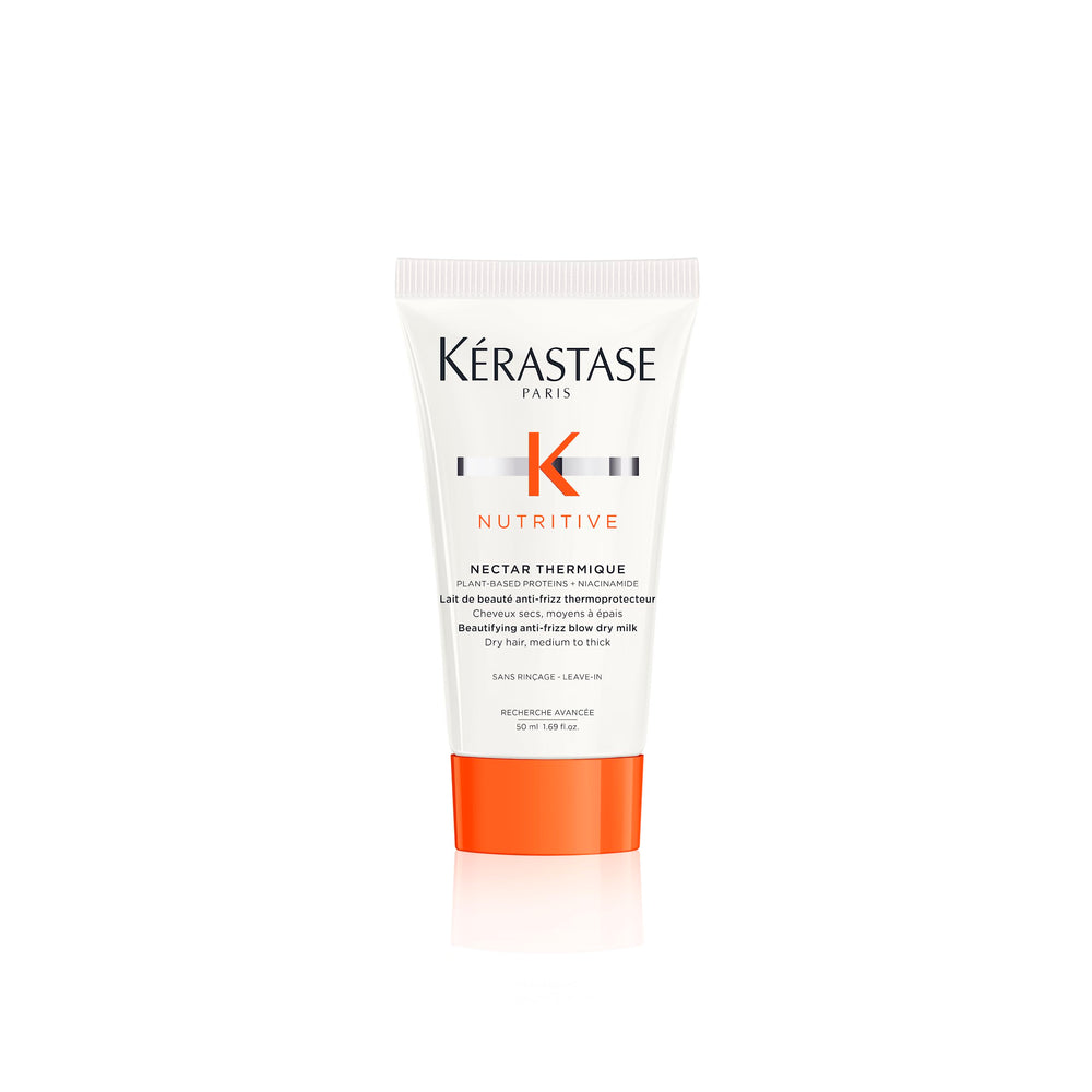 KÉRASTASE Nutritive Nectar Thermique bottle close-up showing heat protection up to 450°F.