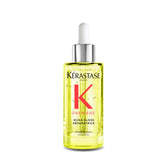 KÉRASTASE Première Repairing Gloss Oil bottle highlights fortifying shine-enhancing formula.