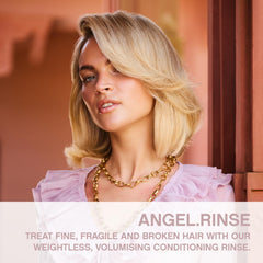 ANGEL.RINSE label close-up highlighting mango and cocoa butter nourishment.