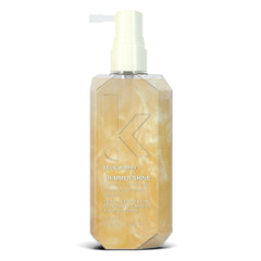 KEVIN.MURPHY SHIMMER.SHINE bottle closeup shows radiant shine boost.