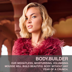 KEVIN.MURPHY BODY.BUILDER mousse foam close-up reveals creamy texture for natural volume.