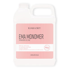 Kiara Sky EMA Monomer bottle close-up showing non-yellowing formula for lasting color.