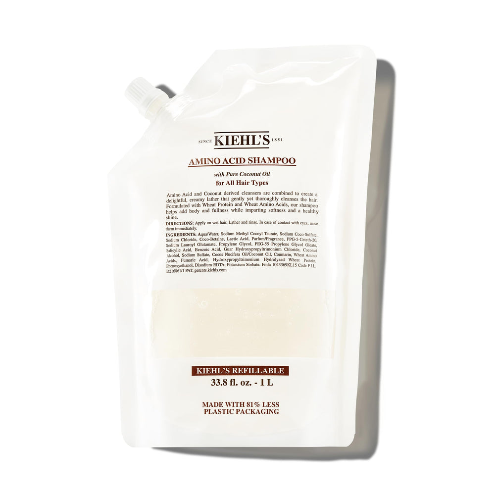 Kiehl's Amino Acid Shampoo bottle shows gentle cleanse for all hair types with moisture.