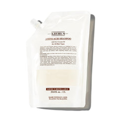 Kiehl's Amino Acid Shampoo bottle shows gentle cleanse for all hair types with moisture.