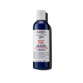 Kiehl's Body Fuel bottle close-up showcases energizing formula for refreshed skin and scalp daily.