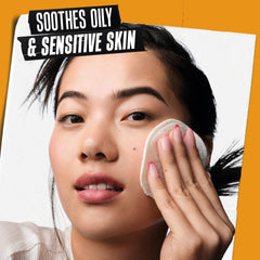 Kiehl's Calendula toner on cotton pad for gentle soothing application