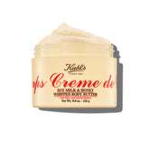Kiehl's Creme de Corps Whipped Butter jar closeup for rich hydration and smooth skin.