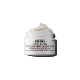 Kiehl's Ultra Facial Overnight Mask bottle closeup for hydration and barrier support.