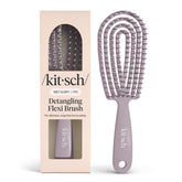 Kitsch Detangler Brush bendable frame close-up shows flexible design for smoother detangling.