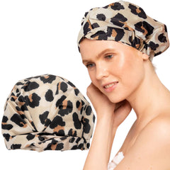 Kitsch leopard shower cap with waterproof fabric keeps hair dry during showers.