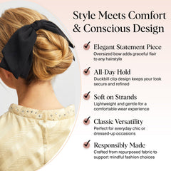 Kitsch oversized black hair bow worn by model for versatile styling