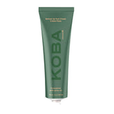 KOBA Bottom Up Foot Cream tube closeup showing moisturizing, hydrating formula.