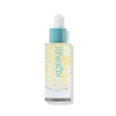 Kopari Star Bright serum bottle close-up highlights encapsulated Vitamin C for gentle daily brightening.