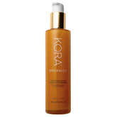 KORA Organics Turmeric Glow Foaming Cleanser foam closeup shows rich lather for a deeper cleanse.