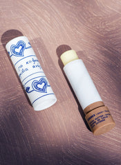 KORRES Lip Butter Stick close-up of lips with hydrating color.