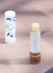 KORRES Lip Butter Stick cocoa-butter packaging highlighting nourishing formula.
