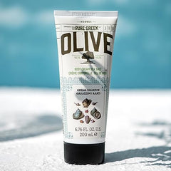 KORRES body lotion cream texture shows quick absorption and smooth feel.