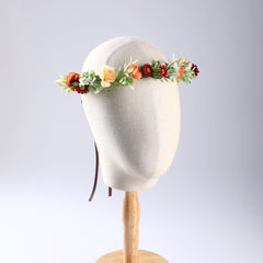 KorViSHOW women's floral crown portrait shot with dreamy lighting.