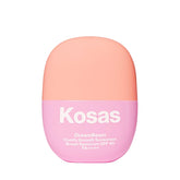 Kosas DreamBeam travel-size sunscreen bottle ready to prep skin for makeup.