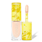 Kosas Revealer Concealer mini packaging highlights creamy texture for seamless coverage.