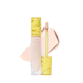 Kosas Revealer concealer tube closeup demonstrates creamy medium coverage for natural-looking skin