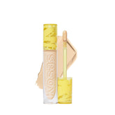Kosas Revealer Concealer tube close-up showing medium coverage for blemish concealment.