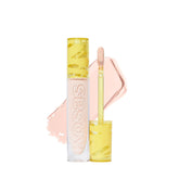 Kosas Revealer Concealer tube closeup showing smooth vegan formula for everyday coverage