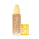 Kosas Revealer foundation bottle pump close-up for easy dispensing.