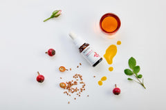 Kosmea Rosehip Oil entire fruit-seed-skin illustration shows full-spectrum nutrients for complexion.