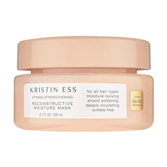 Kristin Ess Hydrating Deep Conditioner bottle demonstrates moisture for dry hair.