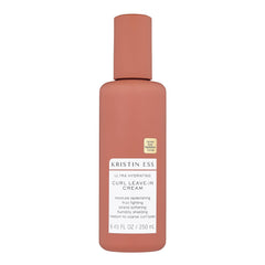 Kristin Ess Ultra Hydrating Curl Leave-In Cream bottle close-up showing hydrated curls.