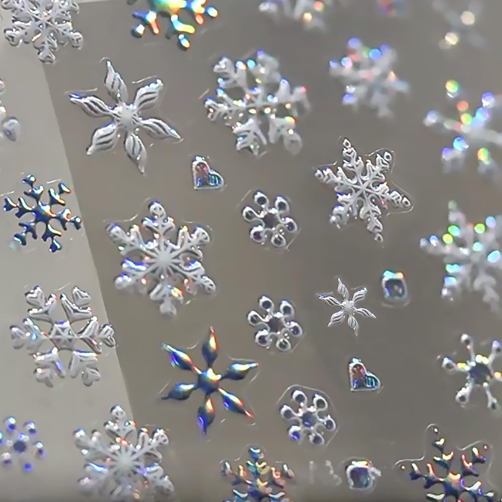 KRTBKR snowflake nail stickers sheet closeup for festive 5D embossed designs on nails.