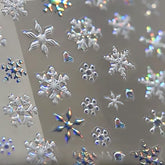 KRTBKR snowflake nail stickers sheet closeup for festive 5D embossed designs on nails.
