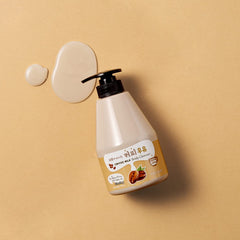 Kwailnara Coffee Milk Body Wash pour showcases creamy lather with coffee aroma.