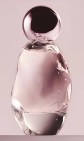 Kylie Cosmic EDP bottle art showing sculptural form for a premium mood boost