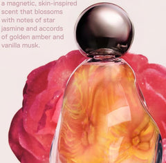 Kylie Cosmic EDP bottle in hand suggests intimate, skin-inspired scent