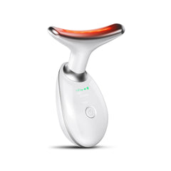 KYOTTANI neck-face massager in use for soothing jawline massage during self-care.
