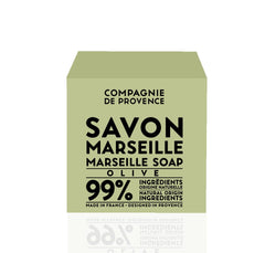 La Compagnie de Provence Savon Marseille Olive Soap Cube 400g face use demonstrates gentle cleansing.