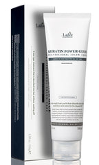 LA'DOR Keratin Power Glue bottle shows leave-in treatment for glossy, protected hair.