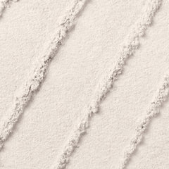 Lancôme Color Design swatch on skin demonstrates crease-resistant wear and vibrant color.