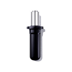 Lancôme Genifique Ultimate Dual Recovery Serum bottle on vanity, ready for daily hydration.