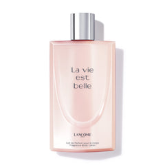 Lancôme La Vie Est Belle lotion bottle showcasing iris scent for radiant skin.