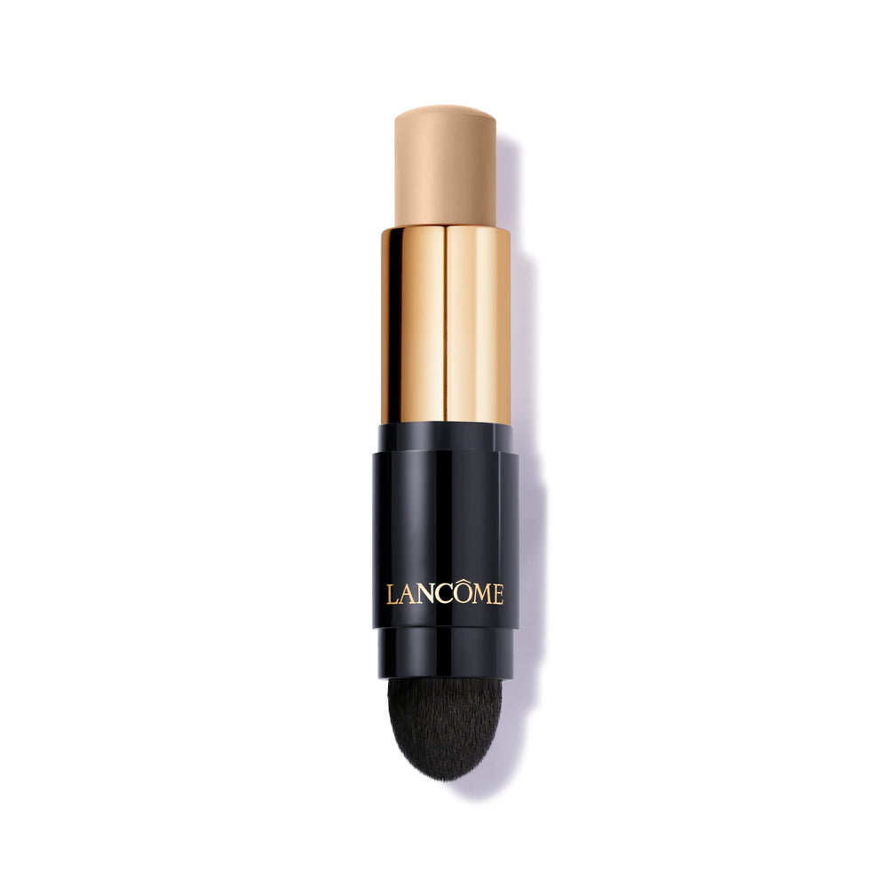 Lancôme Teint Idole Ultra Wear Foundation Stick with built-in kabuki brush for all-day full coverage.