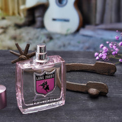 Lane Frost Legendary For Her bottle cap detail emphasizing elegance and premium fragrance craftsmanship