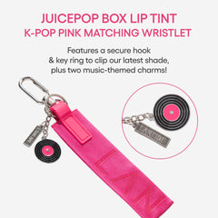 LANEIGE JuicePop Box Lip Tint wristlet attached to bag demonstrates easy access.
