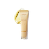 Laneige Lip Glowy Balm Vanilla tube closeup showing compact hydration.