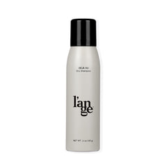 L'ANGE HAIR Deja Vu dry shampoo bottle close-up showing oil absorption for refreshed strands.